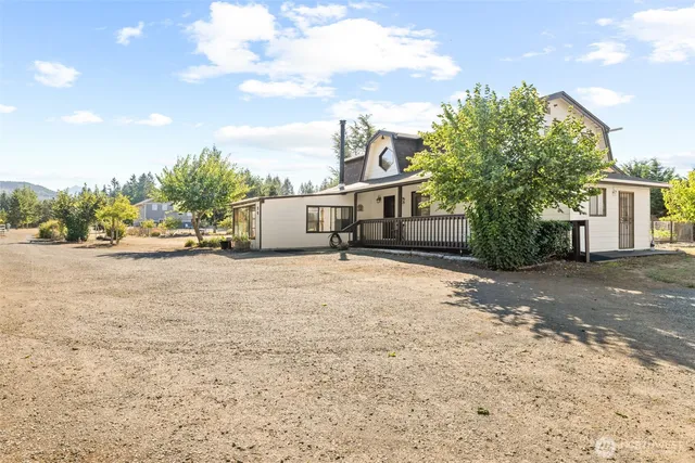 a view of a house with a street