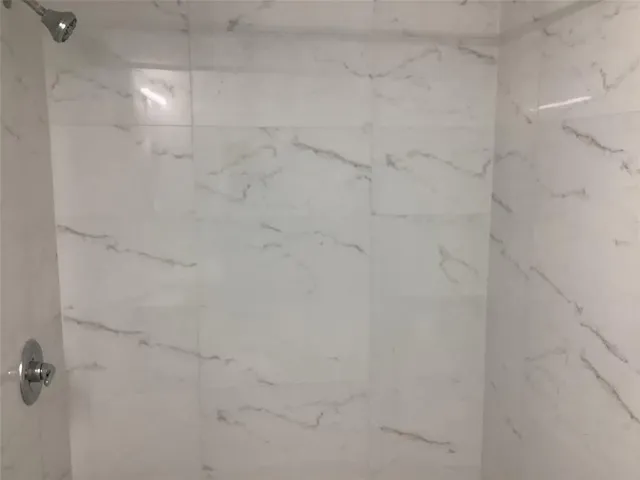 a bathroom with a sink and toilet