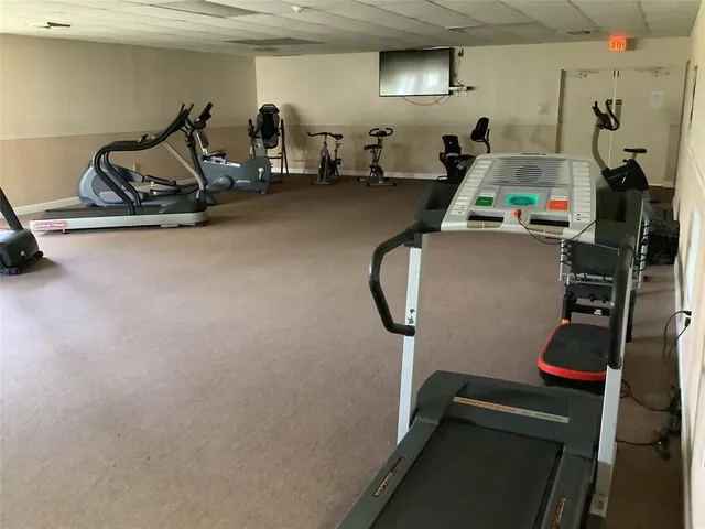 a workspace with furniture and rug