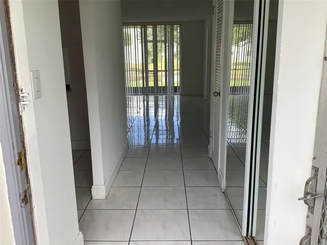 a kitchen with a refrigerator stove and microwave