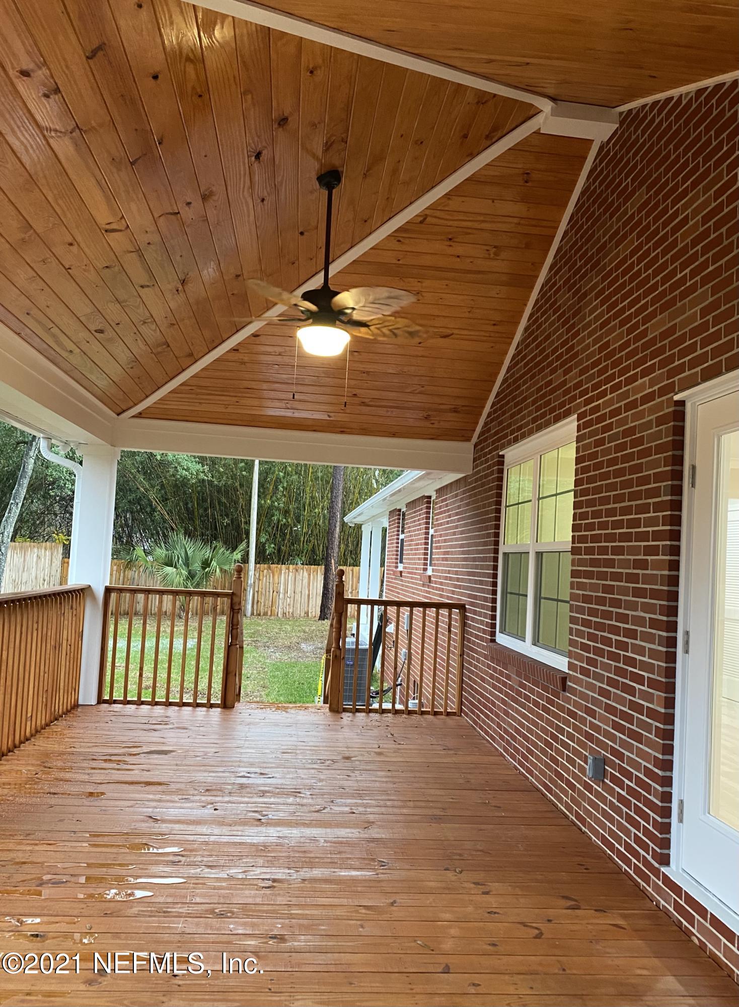 9709 Lily Road Jacksonville, FL 32246 - Photo 44 of 60 a view of a roof deck
