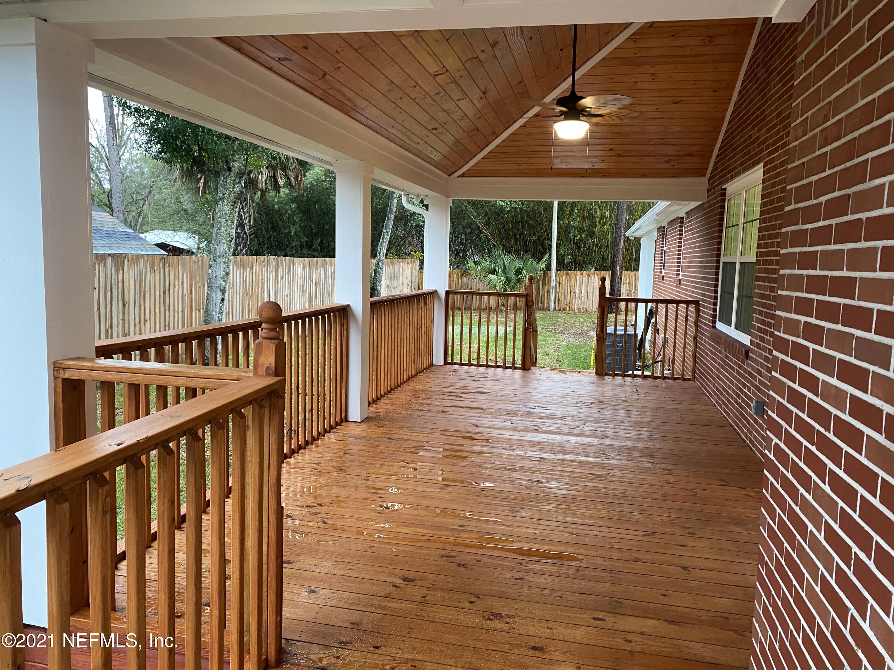 9709 Lily Road Jacksonville, FL 32246 - Photo 45 of 60 a view of balcony with wooden floor