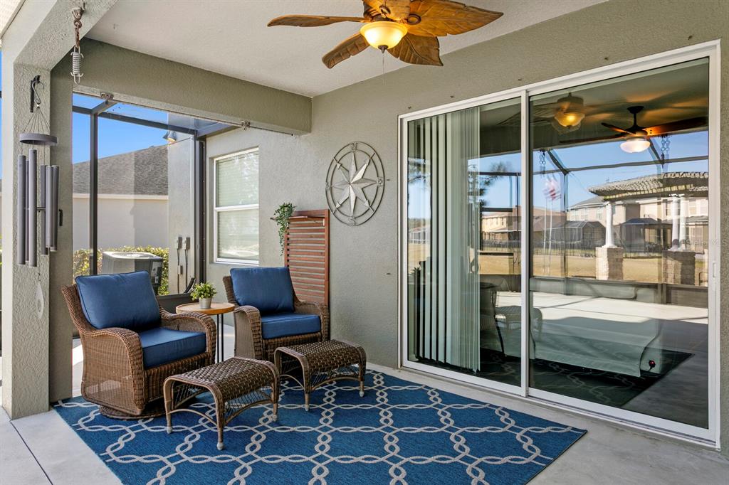 2839 Maple Brook Loop Lutz, FL 33558 - Photo 18 of 61 a bedroom with furniture and a window