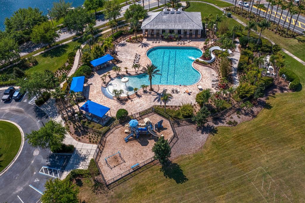 2839 Maple Brook Loop Lutz, FL 33558 - Photo 56 of 61 an aerial view of a house with a garden