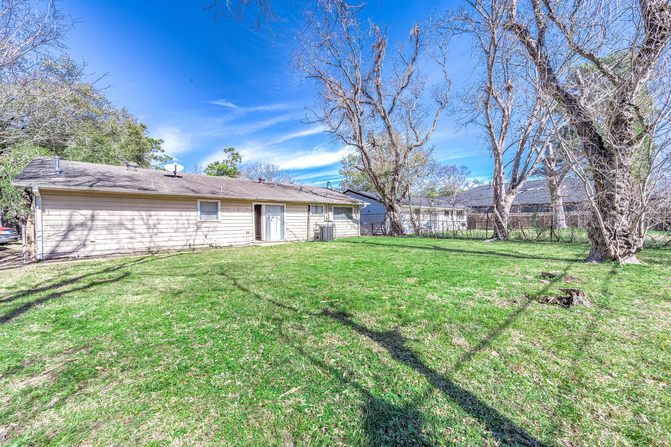 6110 Guadalupe Street Houston, TX 77016 - Photo 19 of 24 front view of a house with a yard