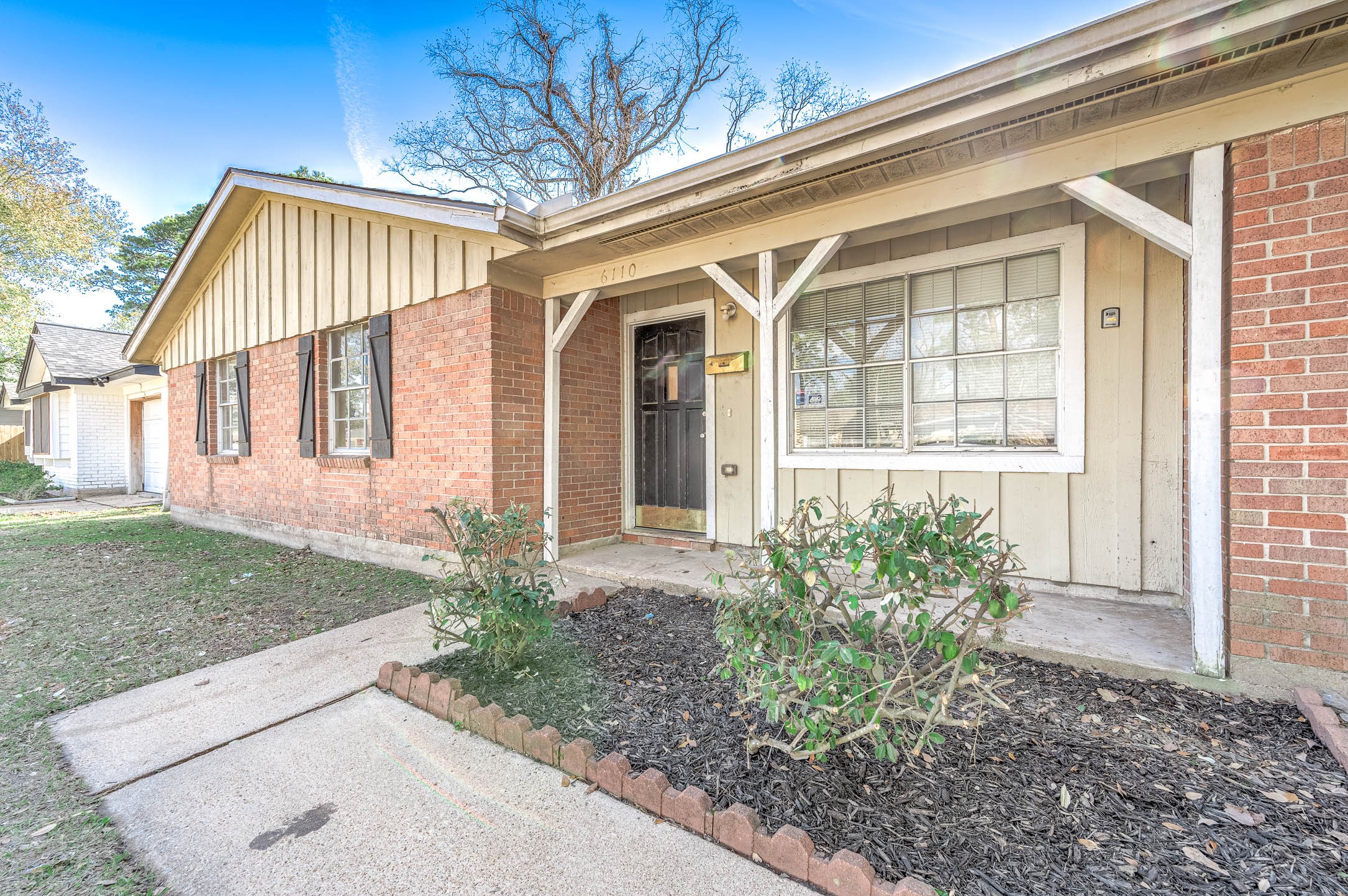 6110 Guadalupe Street Houston, TX 77016 - Photo 24 of 24 a front view of a house with garden