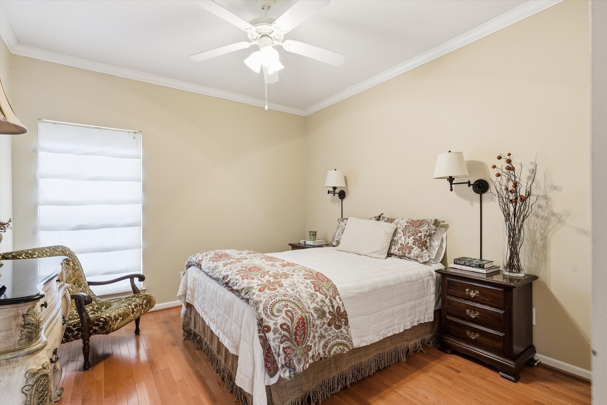132 Windchase Run Hermitage, TN 37076 - Photo 28 of 38 a bedroom with a bed and a chandelier