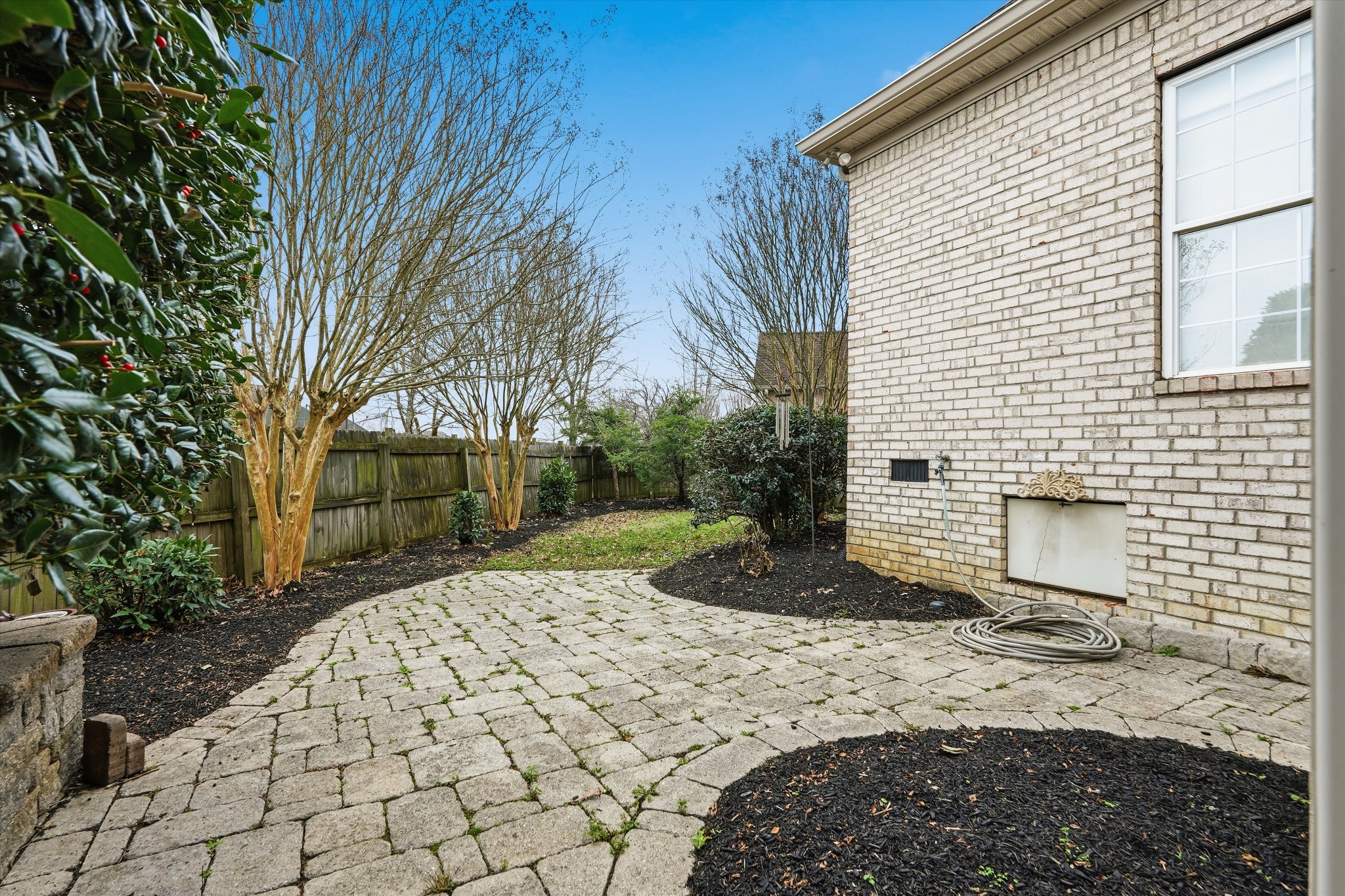 132 Windchase Run Hermitage, TN 37076 - Photo 33 of 38 a view of a backyard with a tree