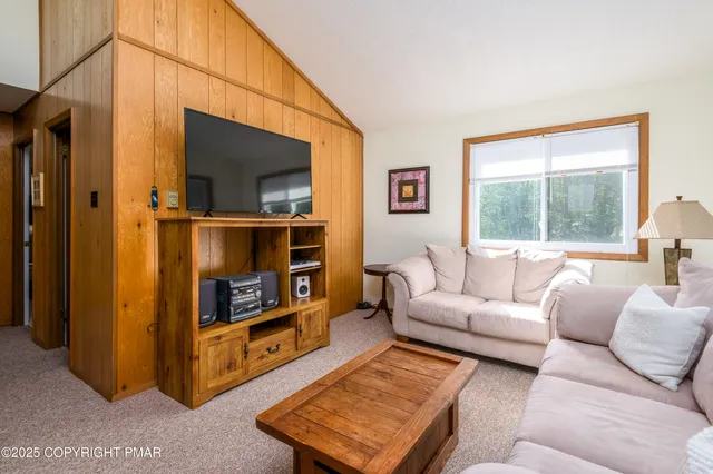 a view of a living room and a couch