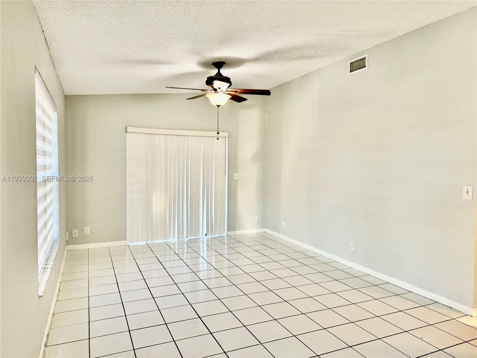 3370 Beau Rivage Drive, Unit 1R Pompano Beach, FL 33064 - Photo 12 of 15 a view of an empty room