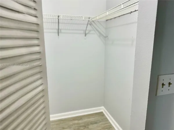 a view of a room with racks on the wall