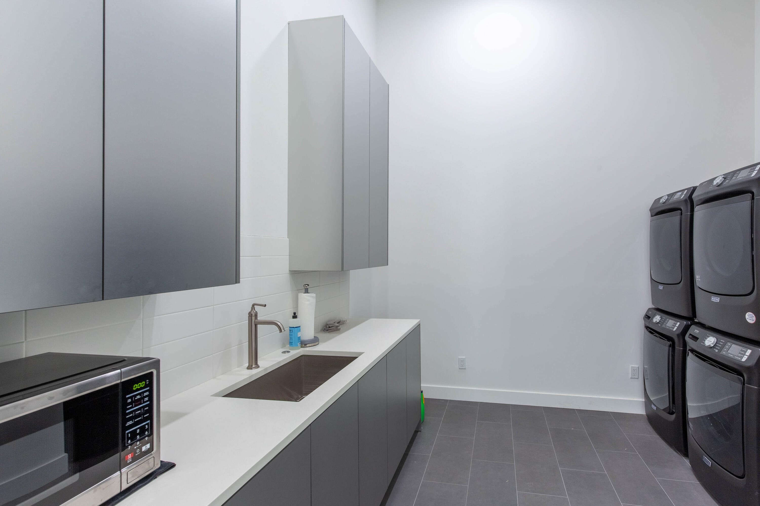 14717 Collecting Canal Road Loxahatchee Groves, FL 33470 - Photo 15 of 27 a view of a kitchen from the sink