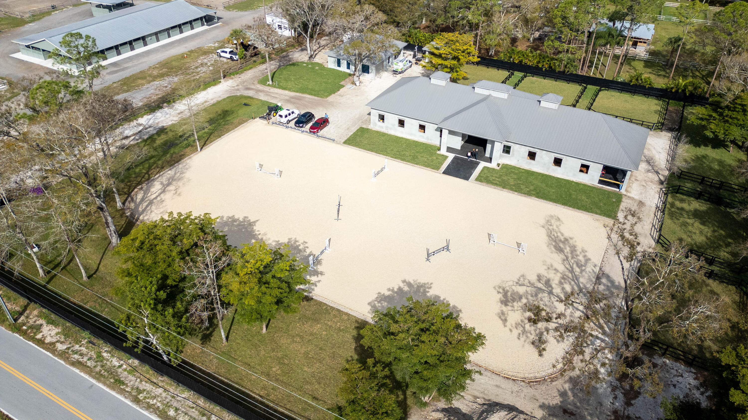14717 Collecting Canal Road Loxahatchee Groves, FL 33470 - Photo 2 of 27 an aerial view of a house with a yard