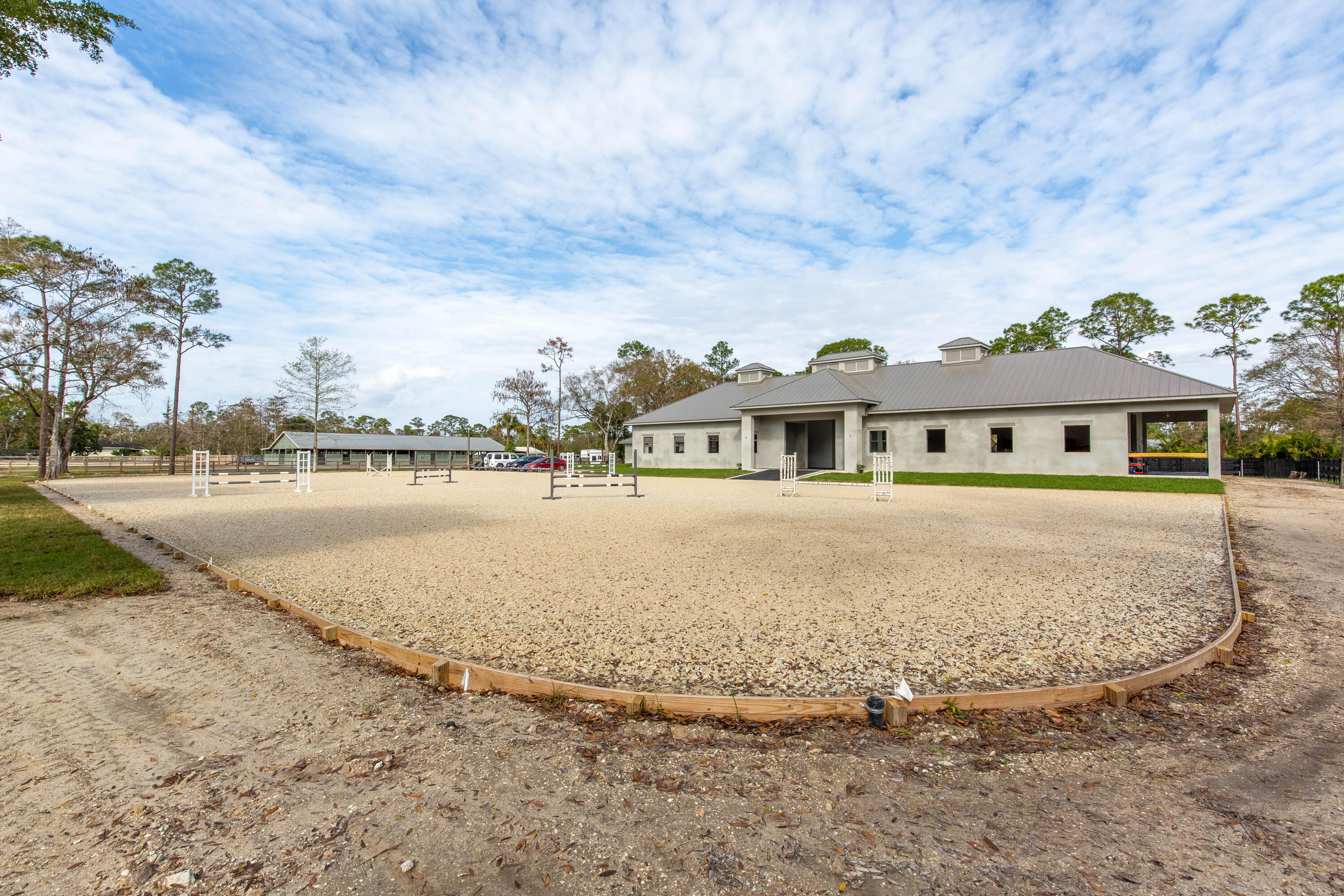 14717 Collecting Canal Road Loxahatchee Groves, FL 33470 - Photo 23 of 27 front view of house with outdoor space