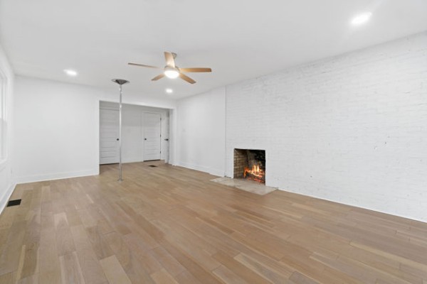 276 East Porters Bluff Road Clarksville, TN 37040 - Photo 20 of 41 a view of empty room with wooden floor and fan