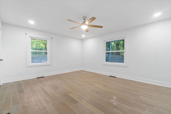 276 East Porters Bluff Road Clarksville, TN 37040 - Photo 22 of 41 an empty room with window and ceiling fan