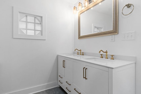 276 East Porters Bluff Road Clarksville, TN 37040 - Photo 27 of 41 a bathroom with a sink vanity and mirror