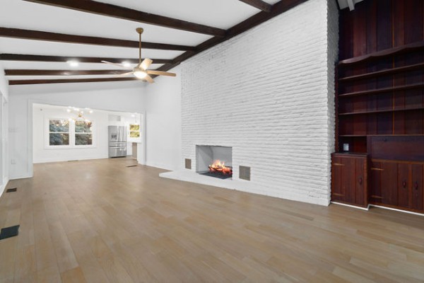276 East Porters Bluff Road Clarksville, TN 37040 - Photo 30 of 41 a view of empty room with a fireplace and wooden floor