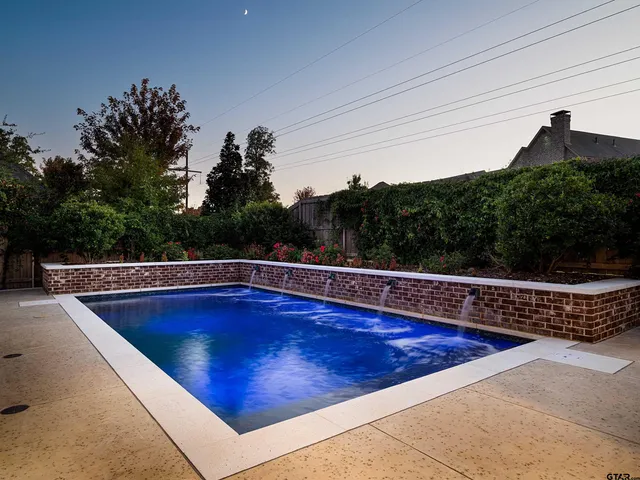 a view of outdoor space and swimming pool