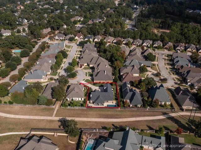 an aerial view of a swimming pool