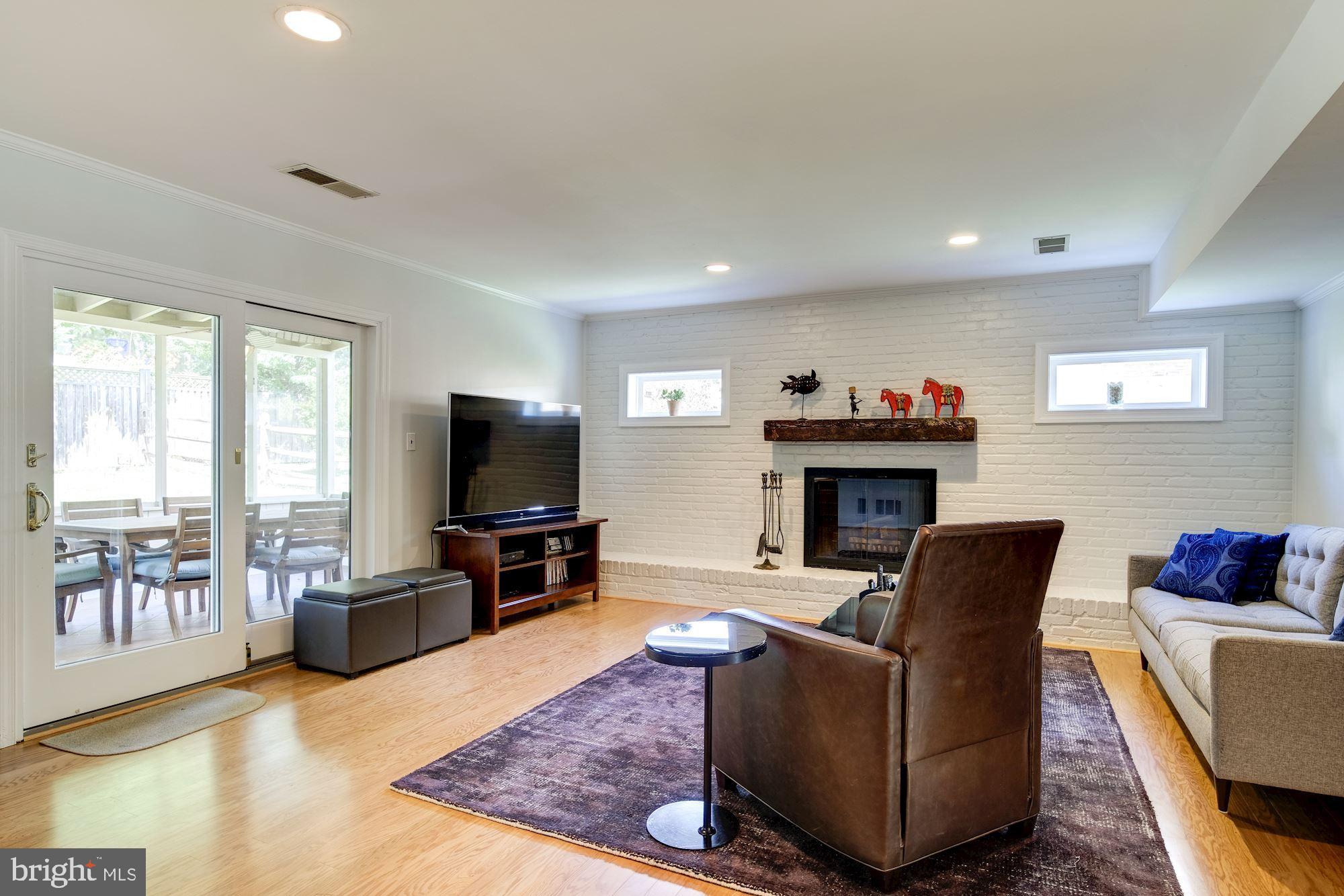 11821 Prestwick Road Potomac, MD 20854 - Photo 12 of 33 Family Room with Access to the Screened- in Porch
