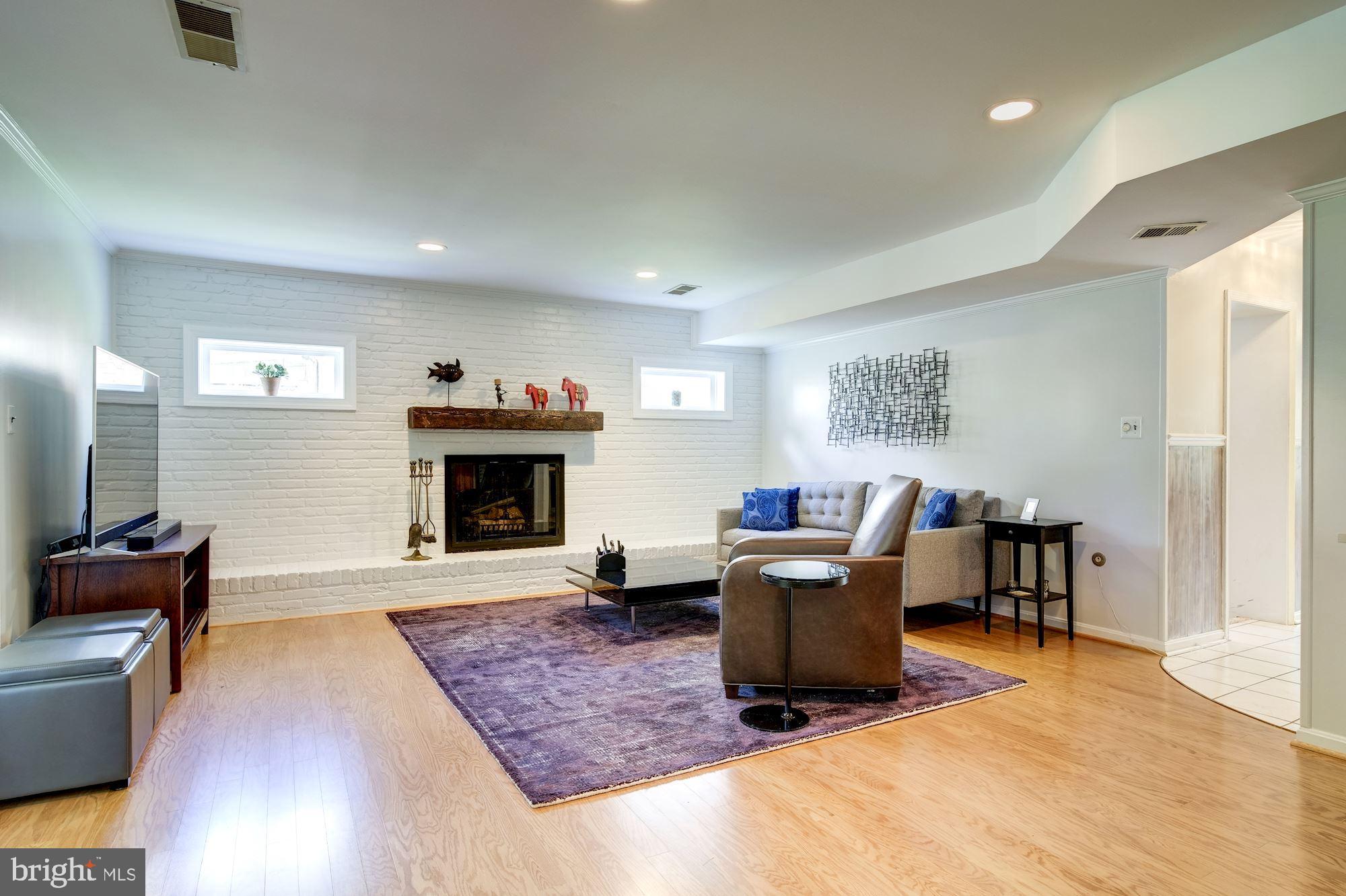 11821 Prestwick Road Potomac, MD 20854 - Photo 13 of 33 Family Room, Wood Burning Fireplace