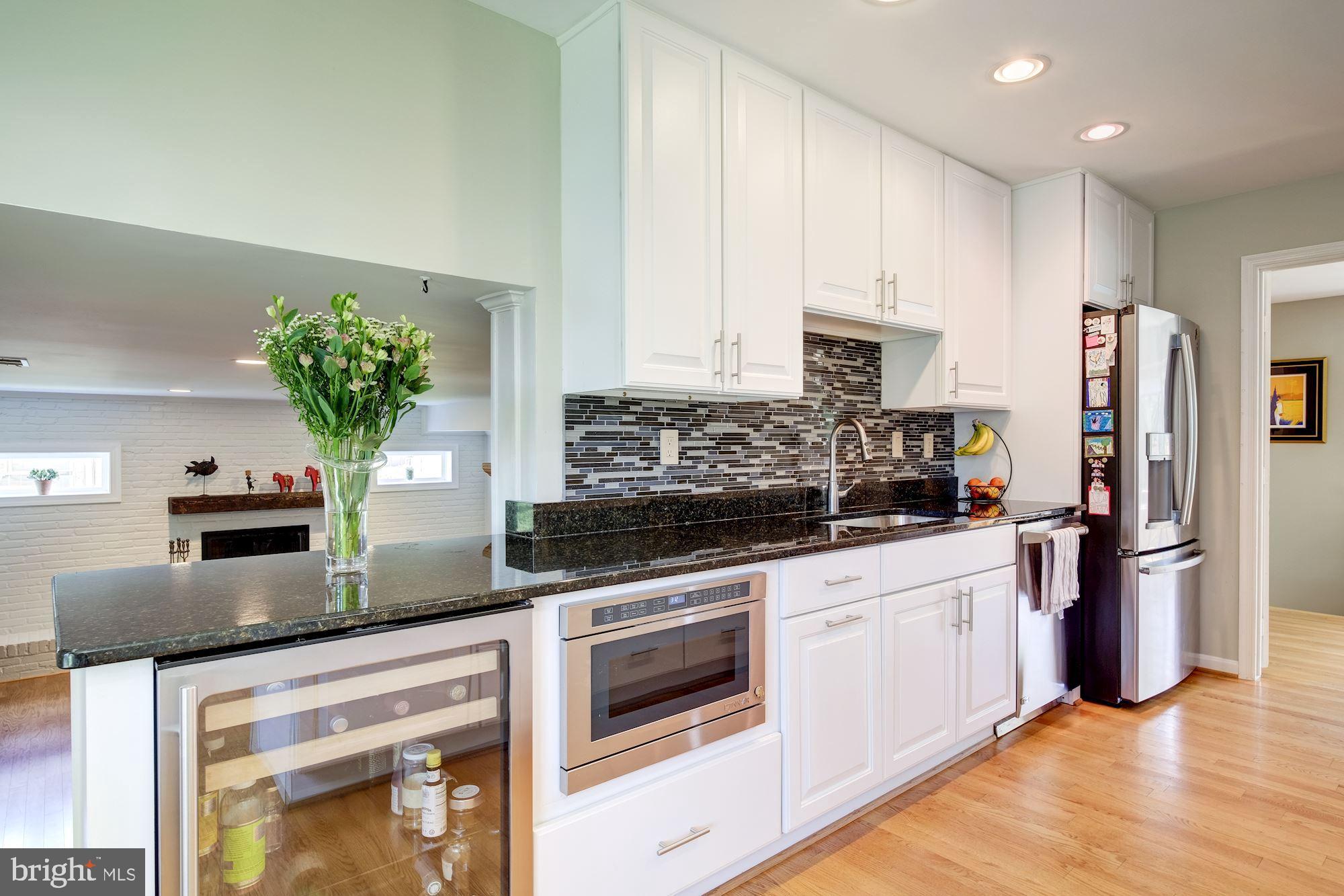 11821 Prestwick Road Potomac, MD 20854 - Photo 10 of 33 Wine Refrigerator and Built-In Microwave