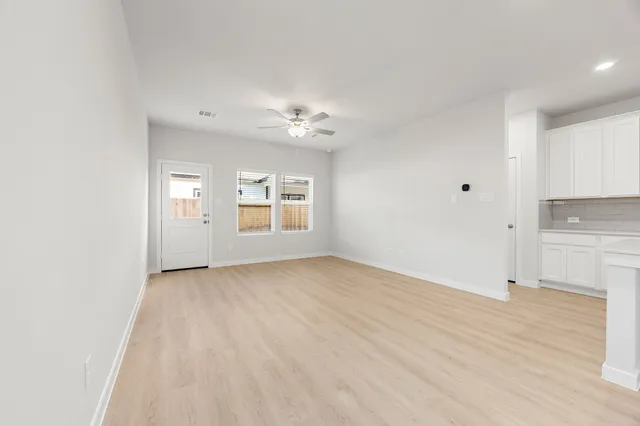 a bathroom with a double vanity sink and mirror
