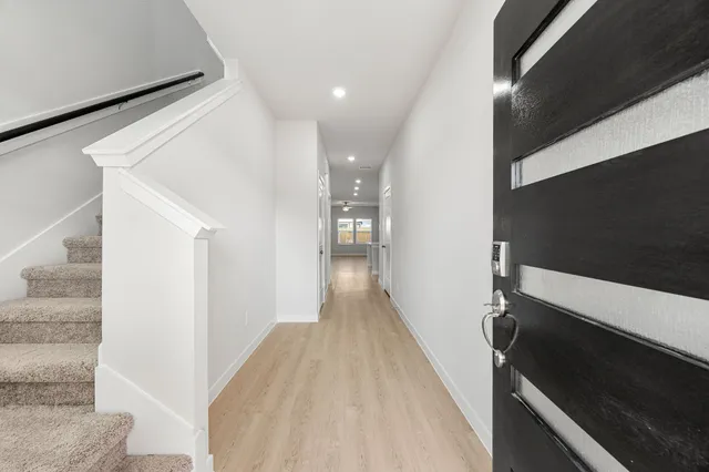 a bathroom with a bathtub and a sink