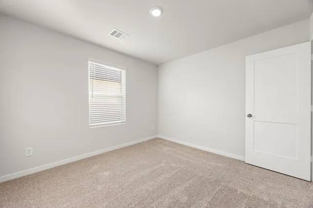 a bathroom with a sink toilet and a mirror