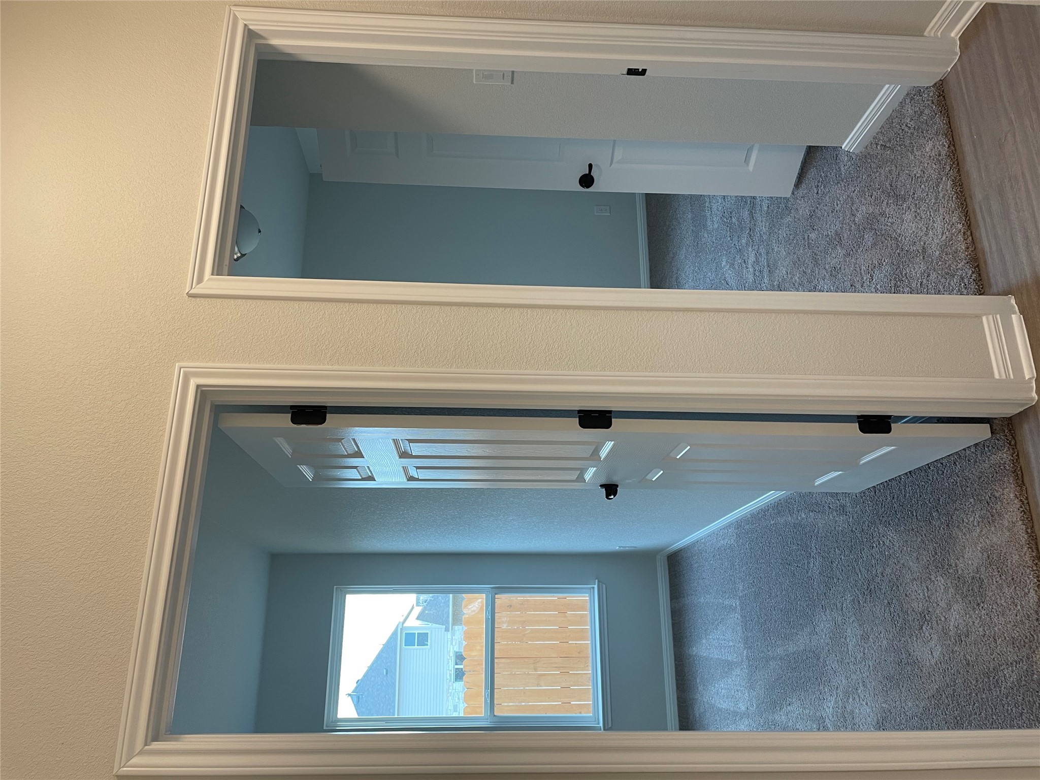3908 Birdwatch Loop, Unit 56 Pflugerville, TX 78660 - Photo 14 of 30 wooden floor and closet in a room