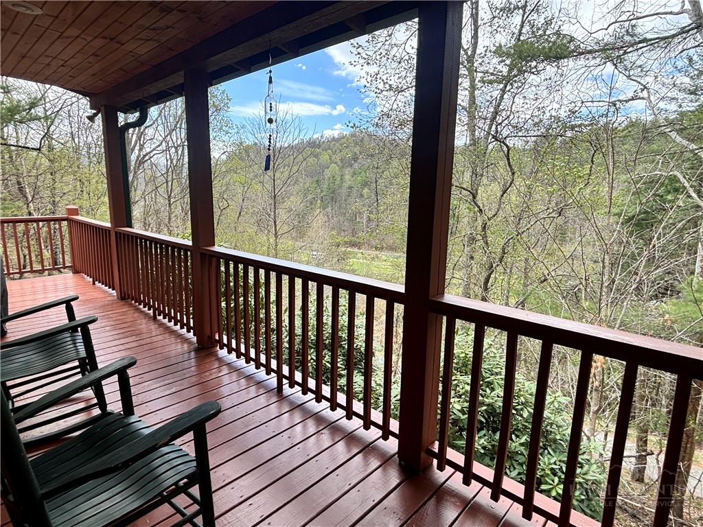 150 Turkey Ridge Crumpler, NC 28617 - Photo 4 of 40 a view of a balcony with wooden floor