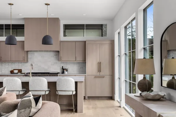 a kitchen with a sink cabinets and appliances