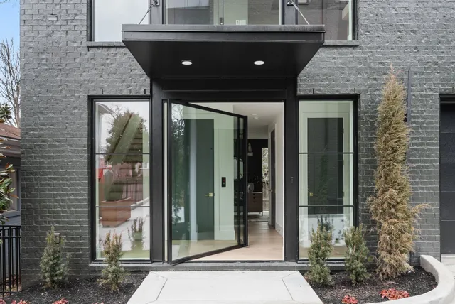 a front view of a house with shower