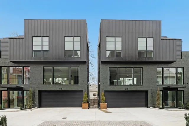 a front view of building with a lot of windows