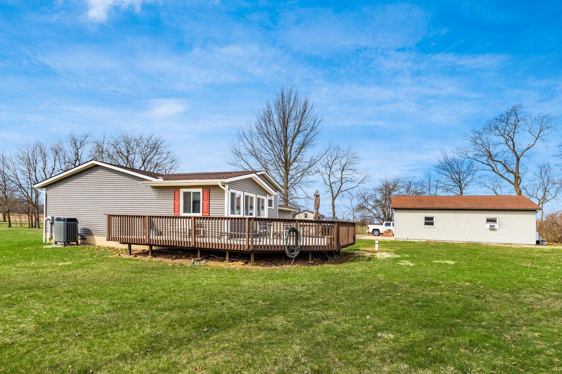 1710 Buttermilk Hill Road Delaware, OH 43015 - Photo 46 of 59 Wrap-around deck offers sunset views.