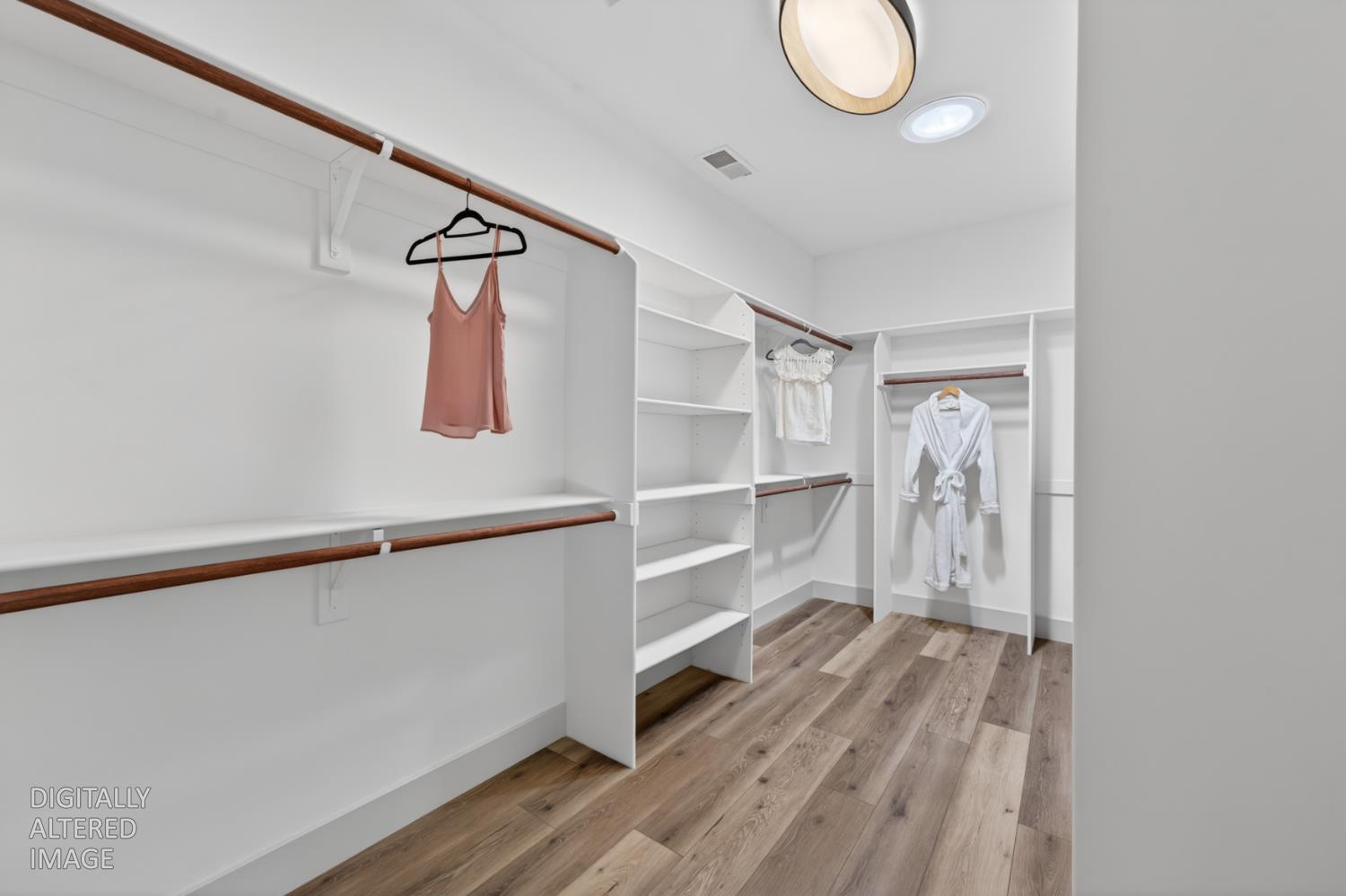 280 Jan Road Grass Valley, CA 95945 - Photo 27 of 66 a view of walk in closet with empty racks