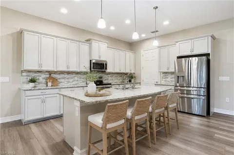 $885,000 | 10240 Avonleigh Drive, Bonita Springs, FL 34135