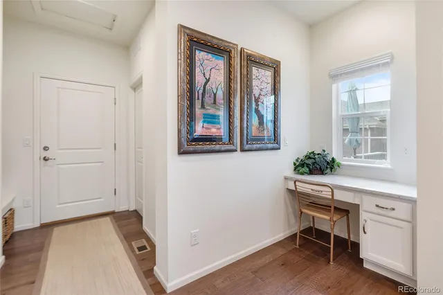 a room that has a bed and a chair in it