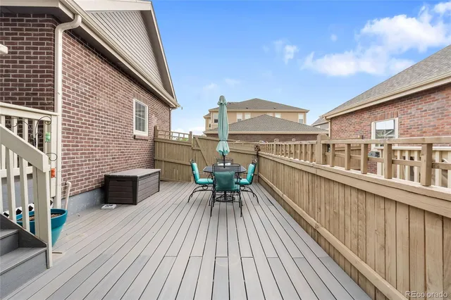 a view of a balcony with chairs