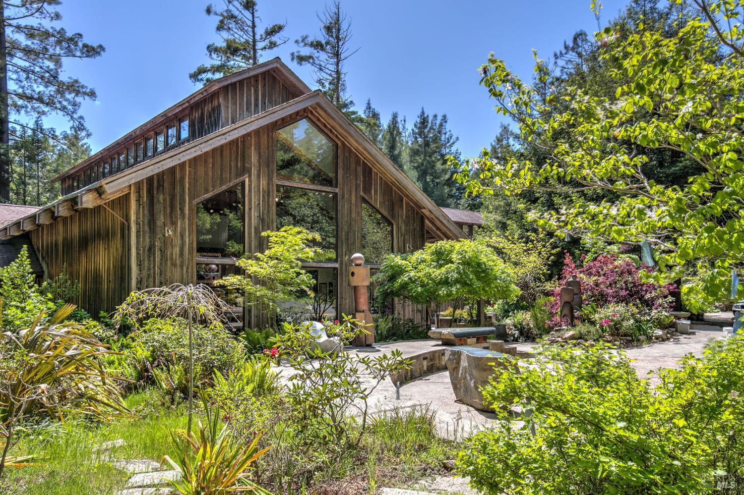 355 Chinquapin Lane The Sea Ranch, CA 95497 - Photo 24 of 31 a front view of a house with a yard