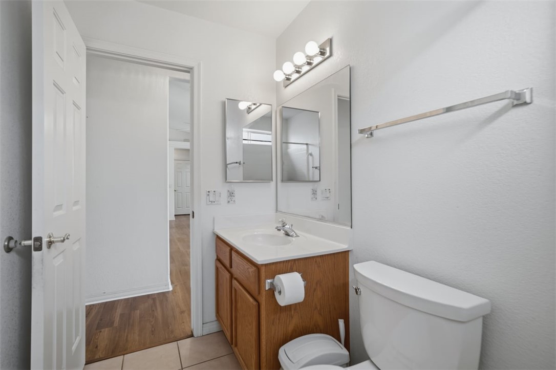 2144 Ridgeview Road Kingman, AZ 86401 - Photo 33 of 49 a bathroom with a toilet sink and mirror