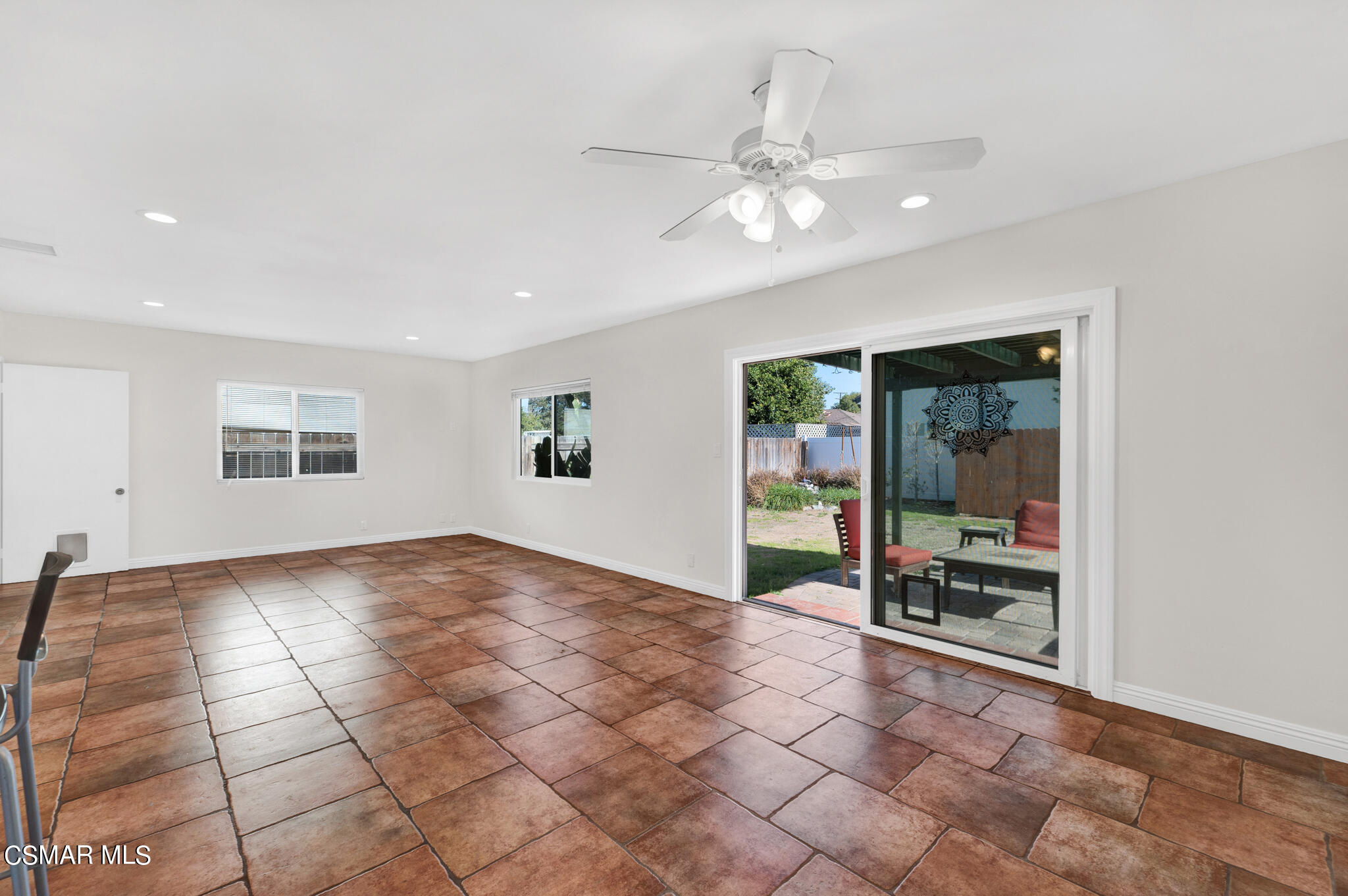 7348 Yolanda Avenue Reseda, CA 91335 - Photo 14 of 23 a view of an empty room with window and chandelier fan