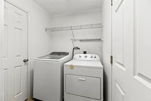a utility room with dryer and washer