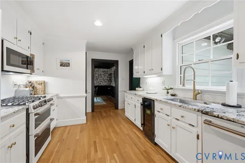 a room with furniture and white walls