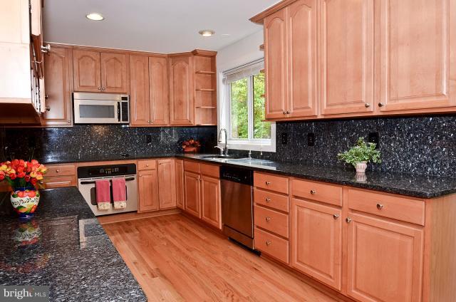 1429 Wolftrap Run Road Vienna, VA 22182 - Photo 9 of 30 Interior (kitchen w/ tree and water view)