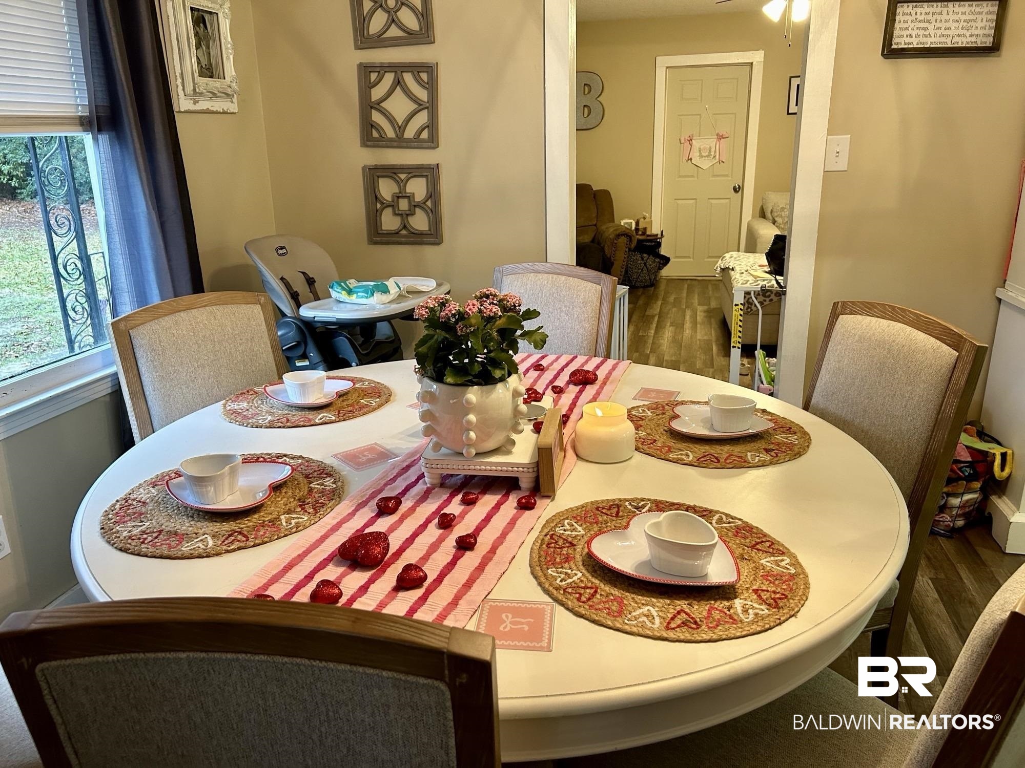 3850 Newman Road Mobile, AL 36695 - Photo 6 of 27 Dining space featuring ceiling fan and dark wood-type flooring
