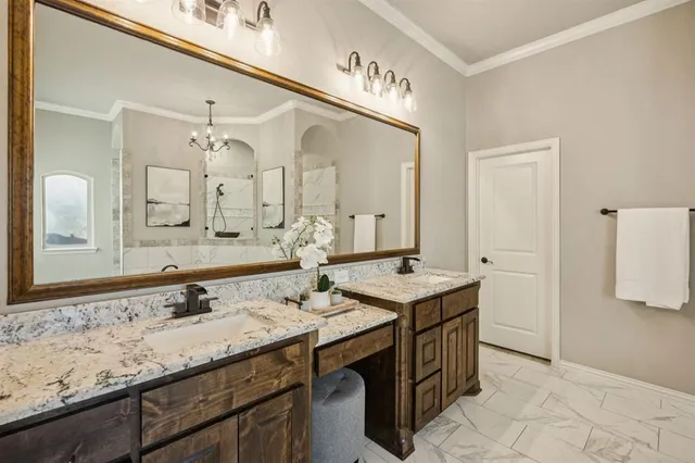 a bathroom with a sink double vanity and a mirror