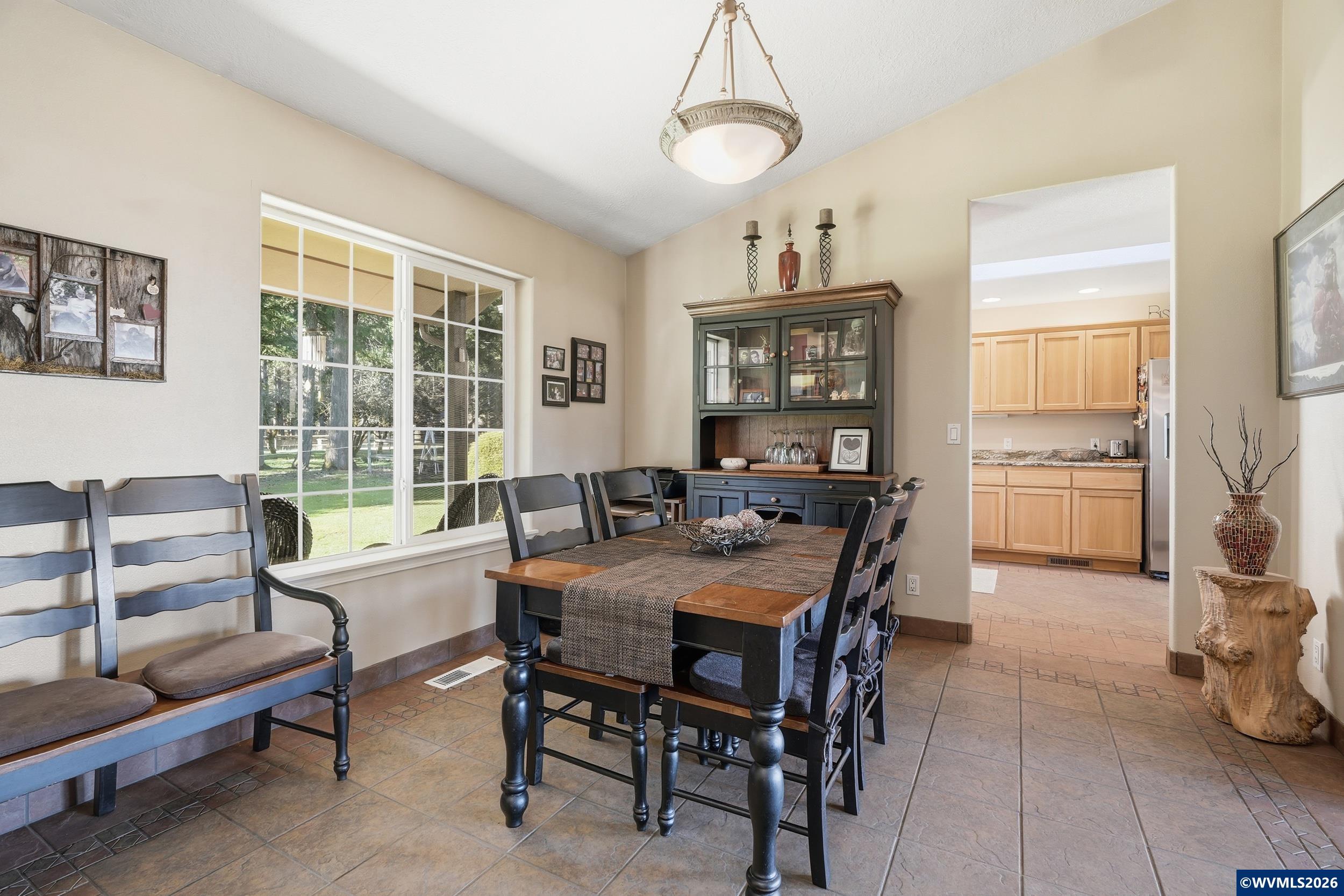 1110 Reuben Boise Road Dallas, OR 97338 - Photo 19 of 49 a dining room with furniture and window