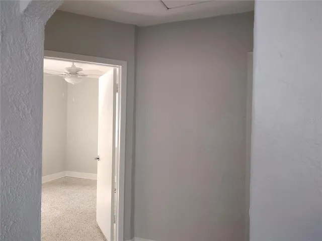 a view of a livingroom with wooden floor